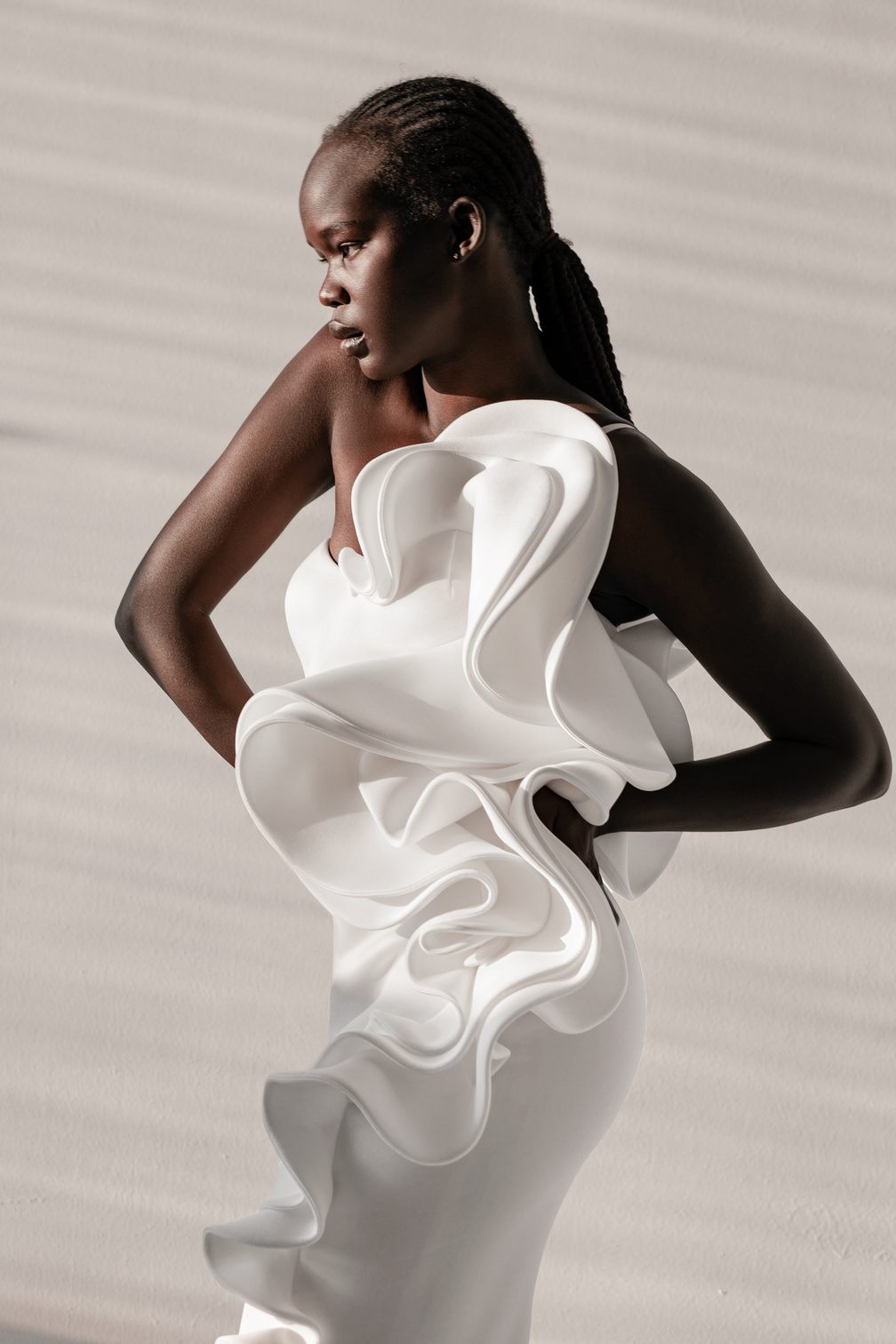 Afro-American Female Model in White Dress with Ruffles